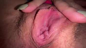 horny teen taking shit while fingering her clit