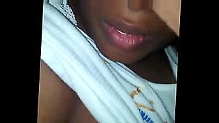 black woman in red lipstick masturbating
