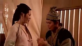 asian girl kissing getting her tits and pussy rubbed by the masseuse on the massage bed