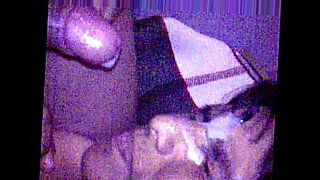 asian girl in black lingery masturbating with vibrators on the couch