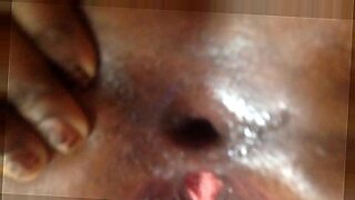 black woman in red lipstick masturbating