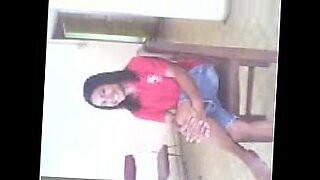 daughter sit on father lap in dining table