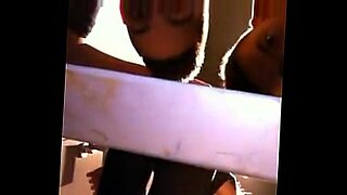 a cute brunette sucks and fucks on camera