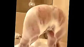buxom blond head is recorded on camera while pleasing a stiff cock