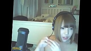 brunette striper dildoing hard and teasing on stage