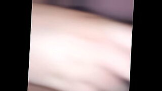 buxom blond head is recorded on camera while pleasing a stiff cock
