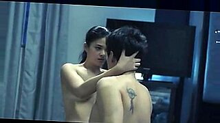 indian couples kissing in bedroom