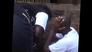 blindfolded guy with ball in his mouth getting rubbed with huge tits by 2 girls