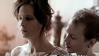 sad mom on step son on bed