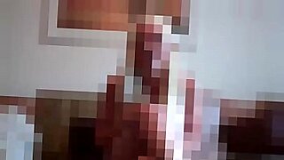 girl instructs man how to use a dildo