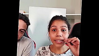 indian couple milk feeding her housband