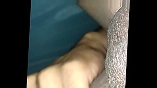 a cute brunette sucks and fucks on camera