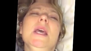 sad mom on step son on bed