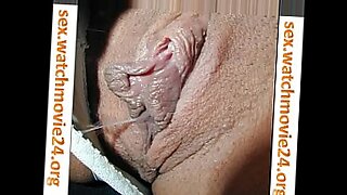 blindfolded guy with ball in his mouth getting rubbed with huge tits by 2 girls