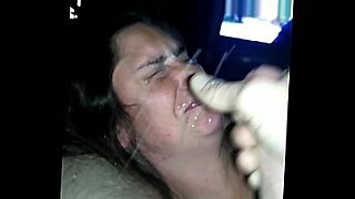 mother sits om sons face