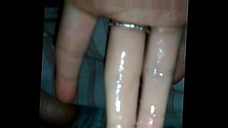 girl instructs man how to use a dildo