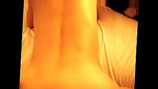 asian girl kissing getting her tits and pussy rubbed by the masseuse on the massage bed