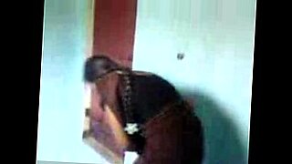 horny office lady giving handjob fingered by guy while standing at the corridor behind the door