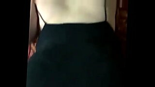girl instructs man how to use a dildo
