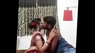 indian couples kissing in bedroom