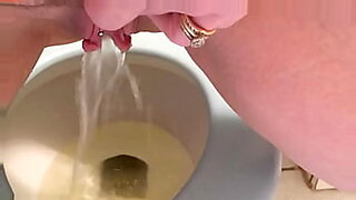 asian girl in black lingery masturbating with vibrators on the couch