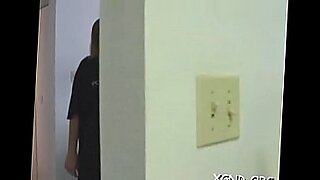girl instructs man how to use a dildo