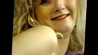 daughter sit on father lap in dining table