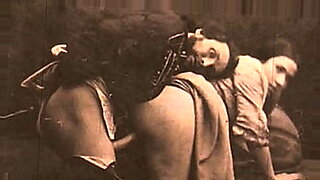 hot slutty teen desperately sucks big cock through gloryhole