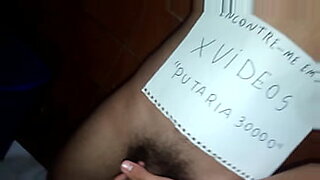 girl instructs man how to use a dildo