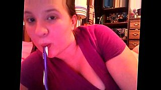 hot babe plays with her toothbrush in the bathroom