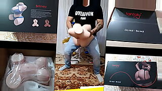 woman blows male sex doll