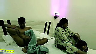 mom and aunt playing game with son